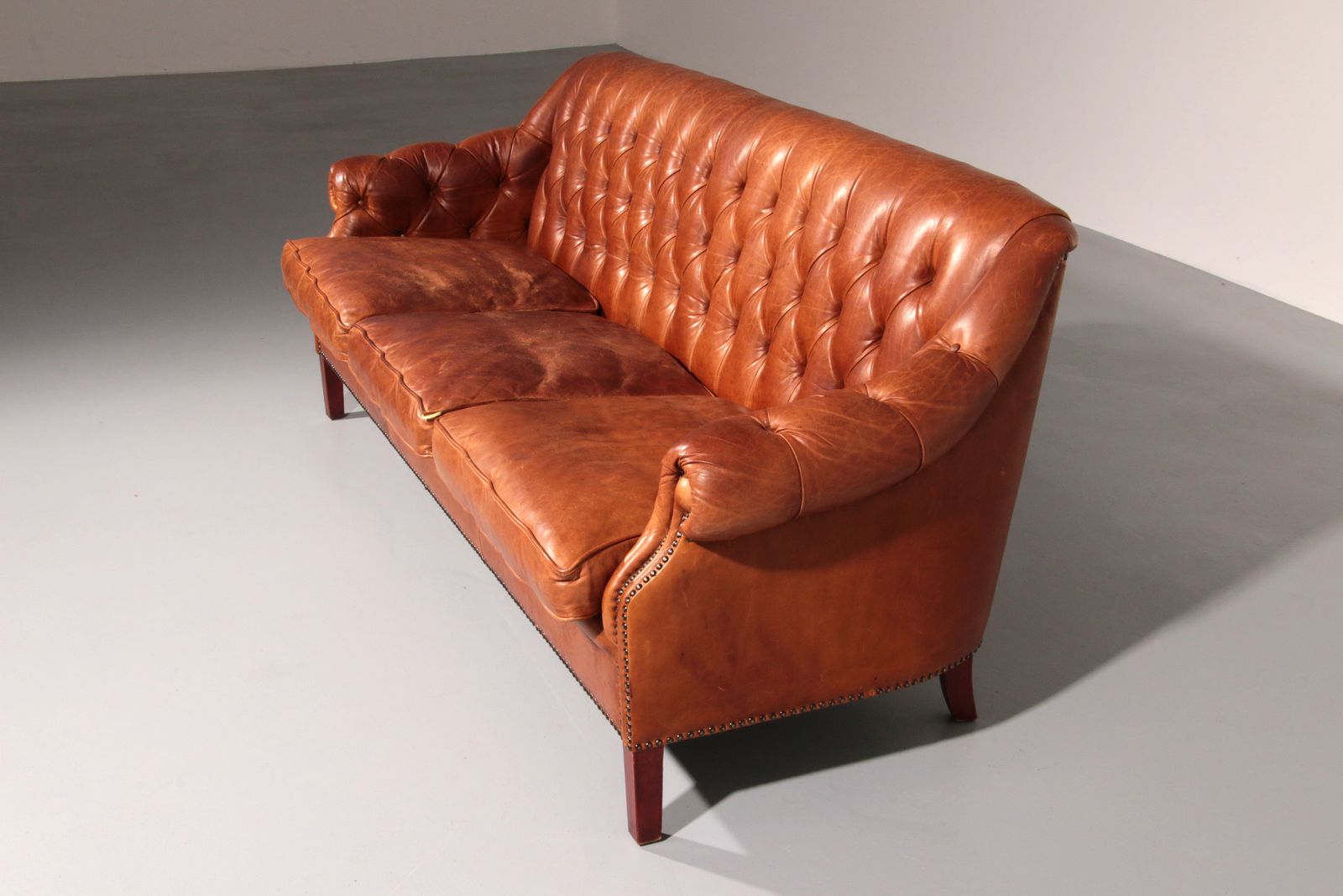 Antiqued Chesterfield Leather Sofa photo for sale