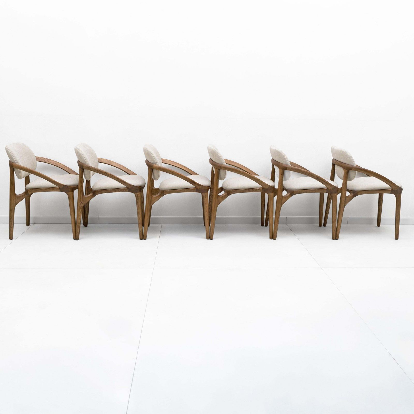 Set Of Six Contemporary Italian Dining Chairs With A Sculptural Curved Frame photo for sale