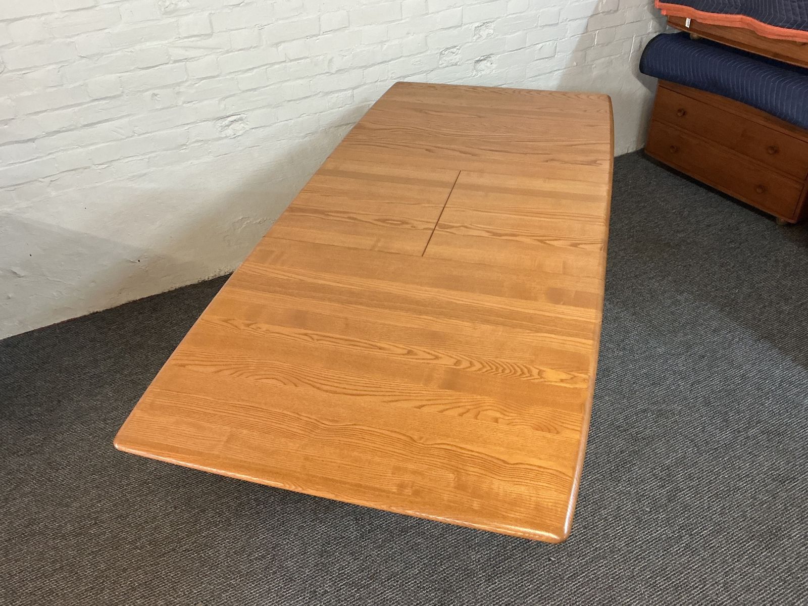 Ercol Windsor Extending Dining Table In Light Finish.