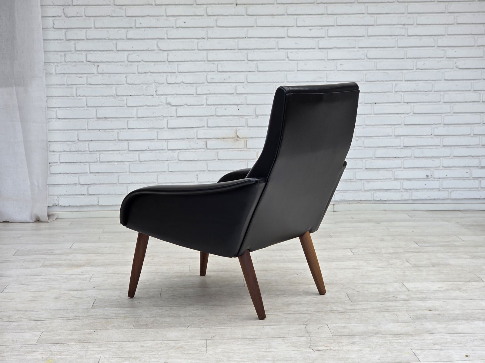 995.0 1970s, Danish Armchair, Black Artificial Leather, Teak Wood Legs. photo