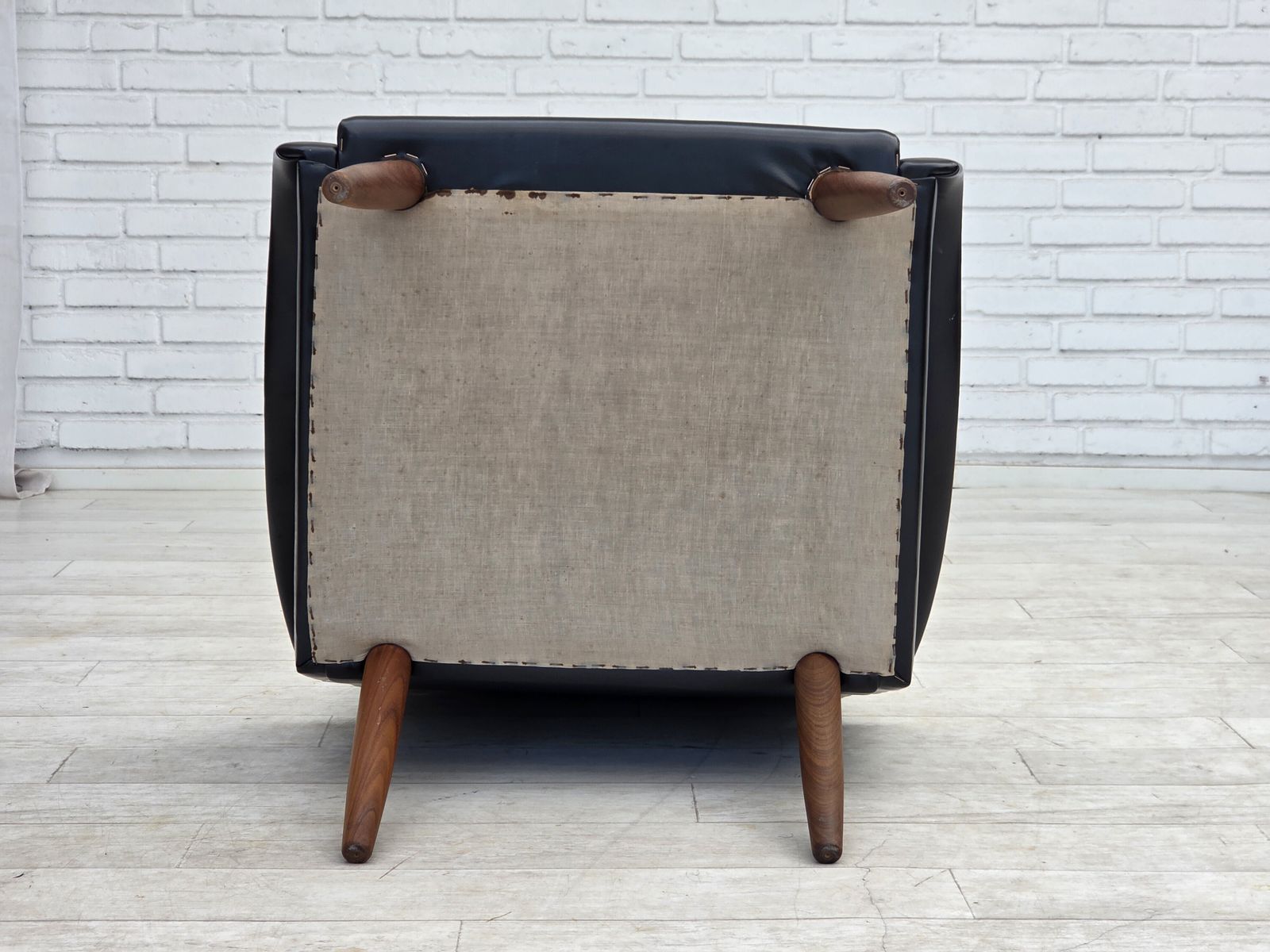 photo buy 1970s, Danish Armchair, Black Artificial Leather, Teak Wood Legs.