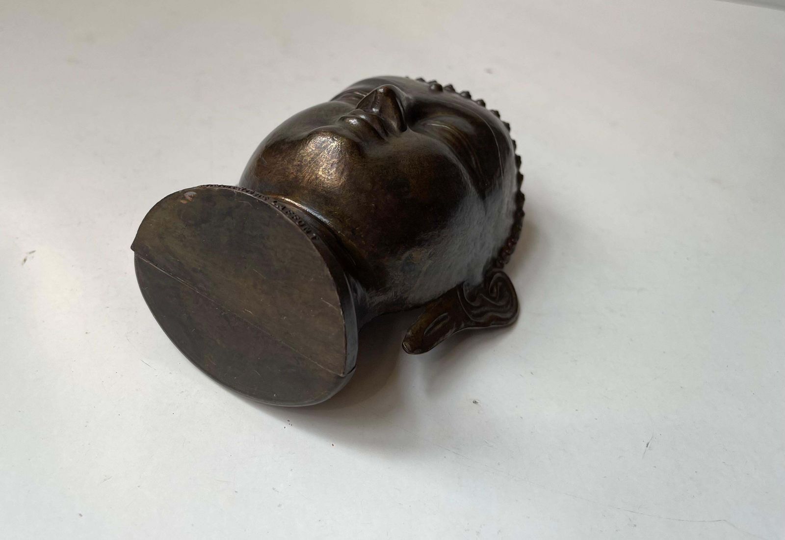 photo for sale Vintage Siddhartha Gautama Buddha Head In Brass Signed By Robert Laffont Edition