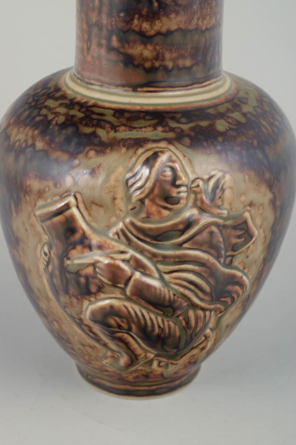 Jais Nielsen, Royal Copenhagen. Vase With Sung Glaze And Figurative Relief Scene photo for sale
