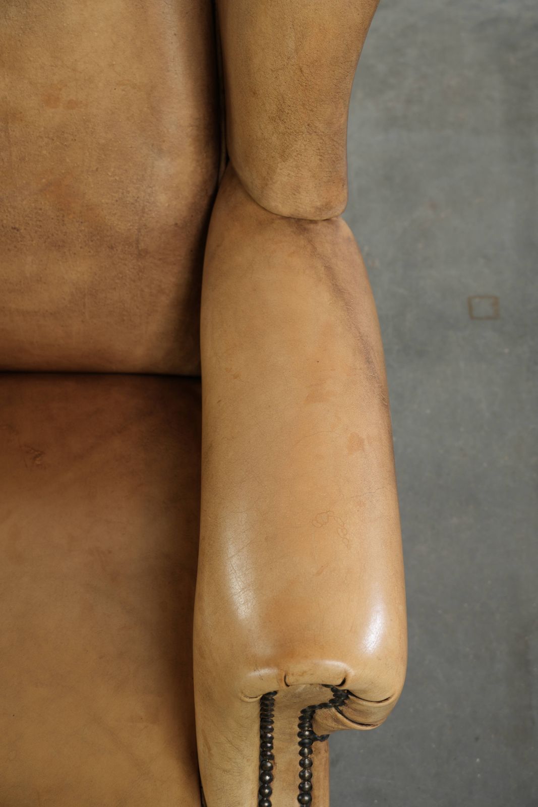 Beautiful Light Cowhide Wing Armchair With A Timeless English Look And Good Seating Comfort photo vintage