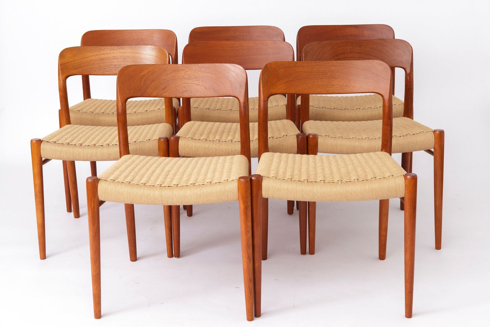 Grote set van 8 Niels Otto Møller teakhouten eetkamerstoelen, Model 75 (ca. jaren 1950), Deense papercord zittingen
