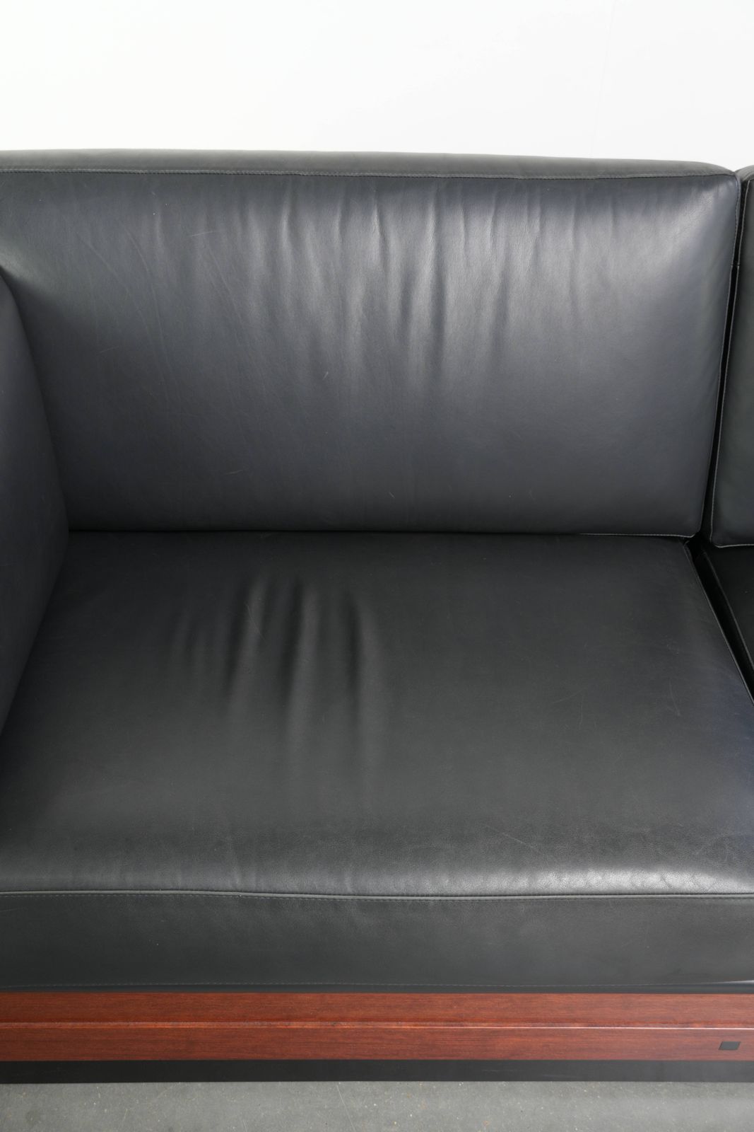 Timeless 3 Seater Art Deco Design Sofa Upholstered In Black Cowhide Leather And Finished With Wooden Details photo vinterior