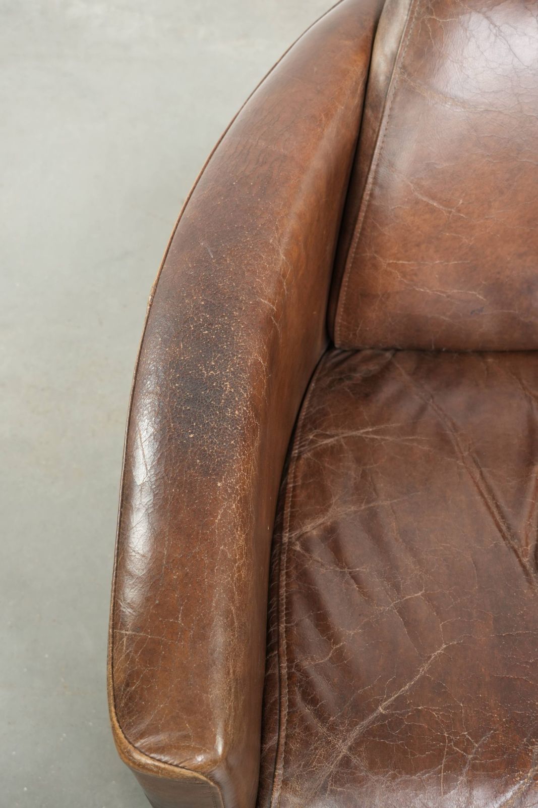 Characterful And Robust Dark Cognac Brown Cowhide Leather Aviator Design Armchair With An Interesting Shape photo buy