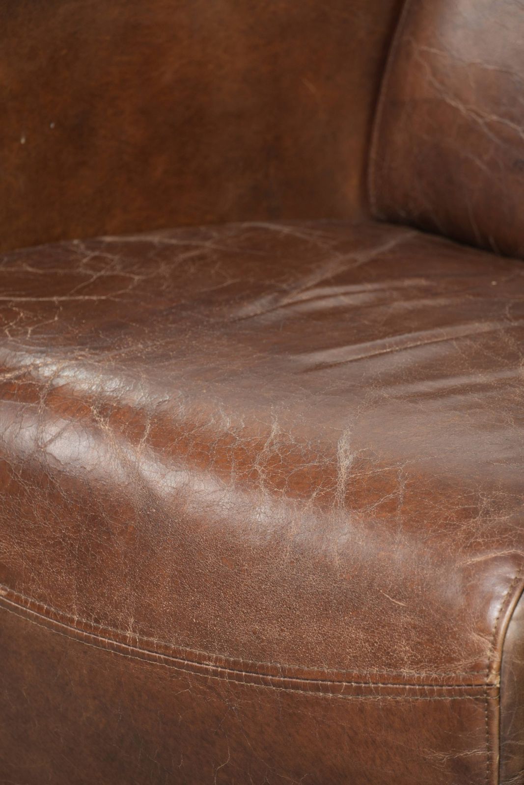 Furniture Characterful And Robust Dark Cognac Brown Cowhide Leather Aviator Design Armchair With An Interesting Shape photo