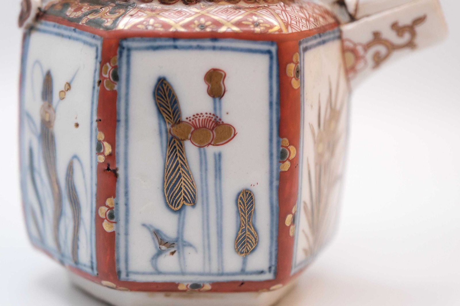 photo for sale Antique Japanese Imari Porcelain Teapot, Hexagonal Form In The Arita Export Tradition, With A Fixed Overhead Porcelain Handle.