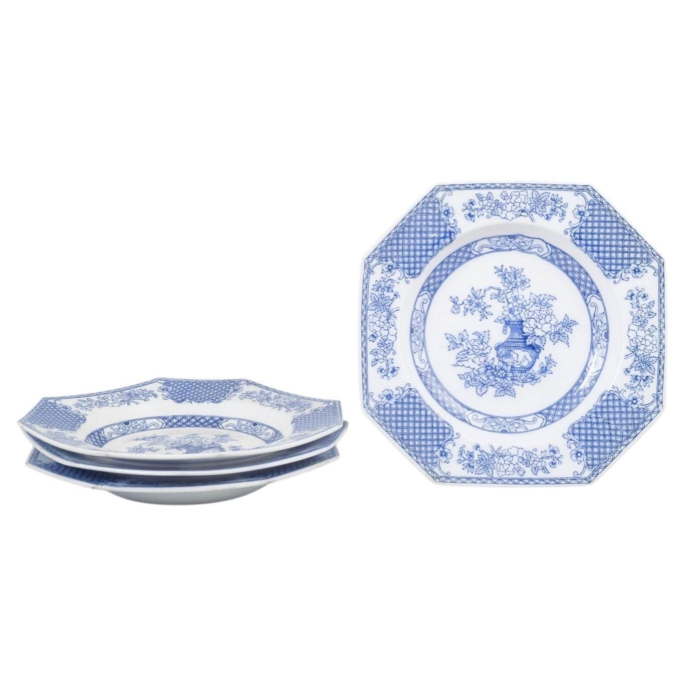 Rörstrand. Four Octagonal Deep Faience Plates. "Hoangho" Series. Early 20th C.
