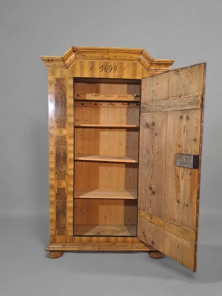 18th Century European Marquetry Wardrobe With Coat Of Arms And Starburst. photo for sale