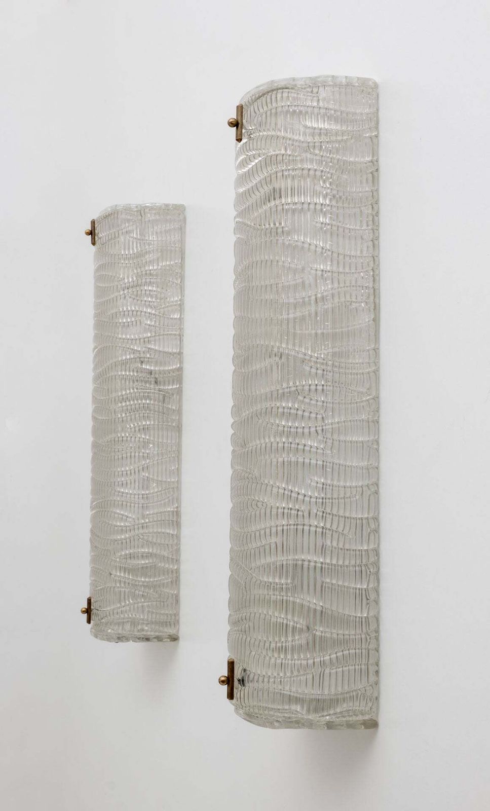Paar moderne Italiaanse Murano-glas wandlampen met textuur photo vinterior