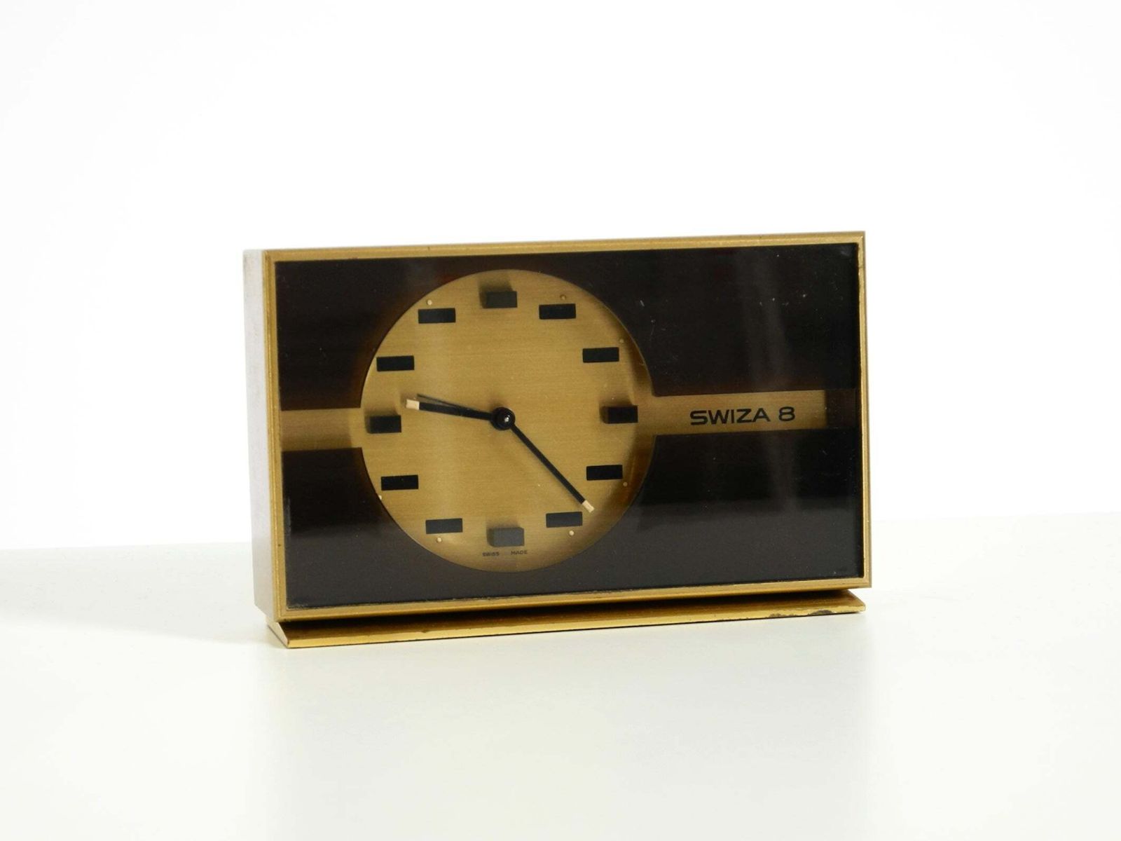 Swiss Made, klein en zeldzaam mechanisch tafelklokje SWIZA 8 in messing photo for sale