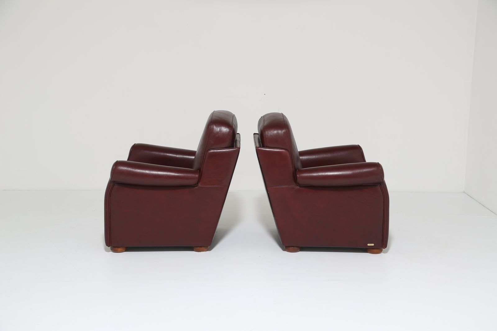 1950.0 Pair Of Art Deco Style Italian Burgundy Leather Club Chairs By Fratelli Mascheroni photo