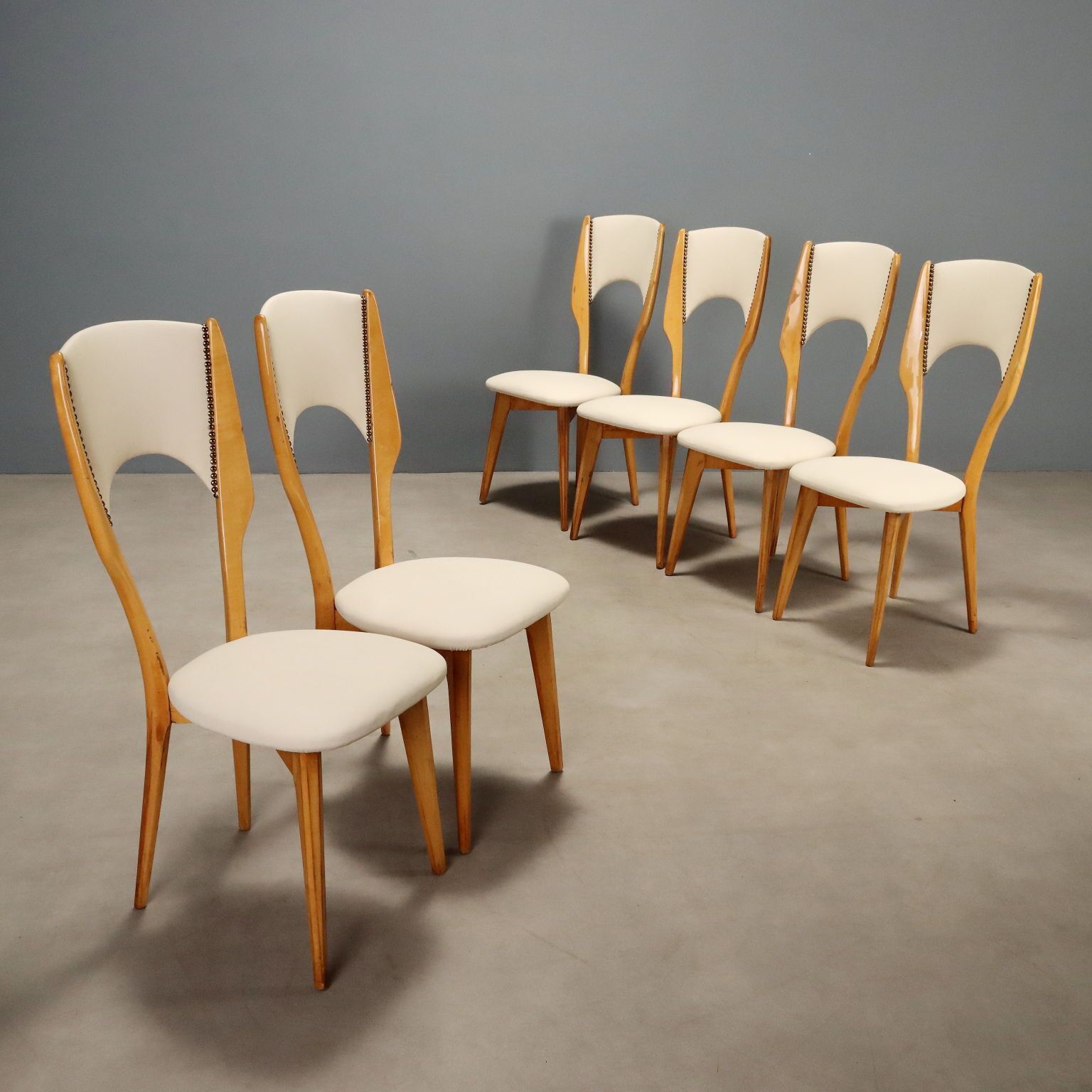 Vintage stoelen beukenhout kunstleer design Italië jaren 1960