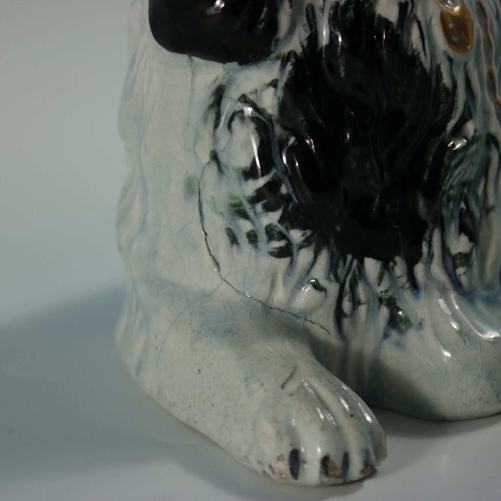 photo for sale Zeldzame Staffordshire Pottery liggende spaniël