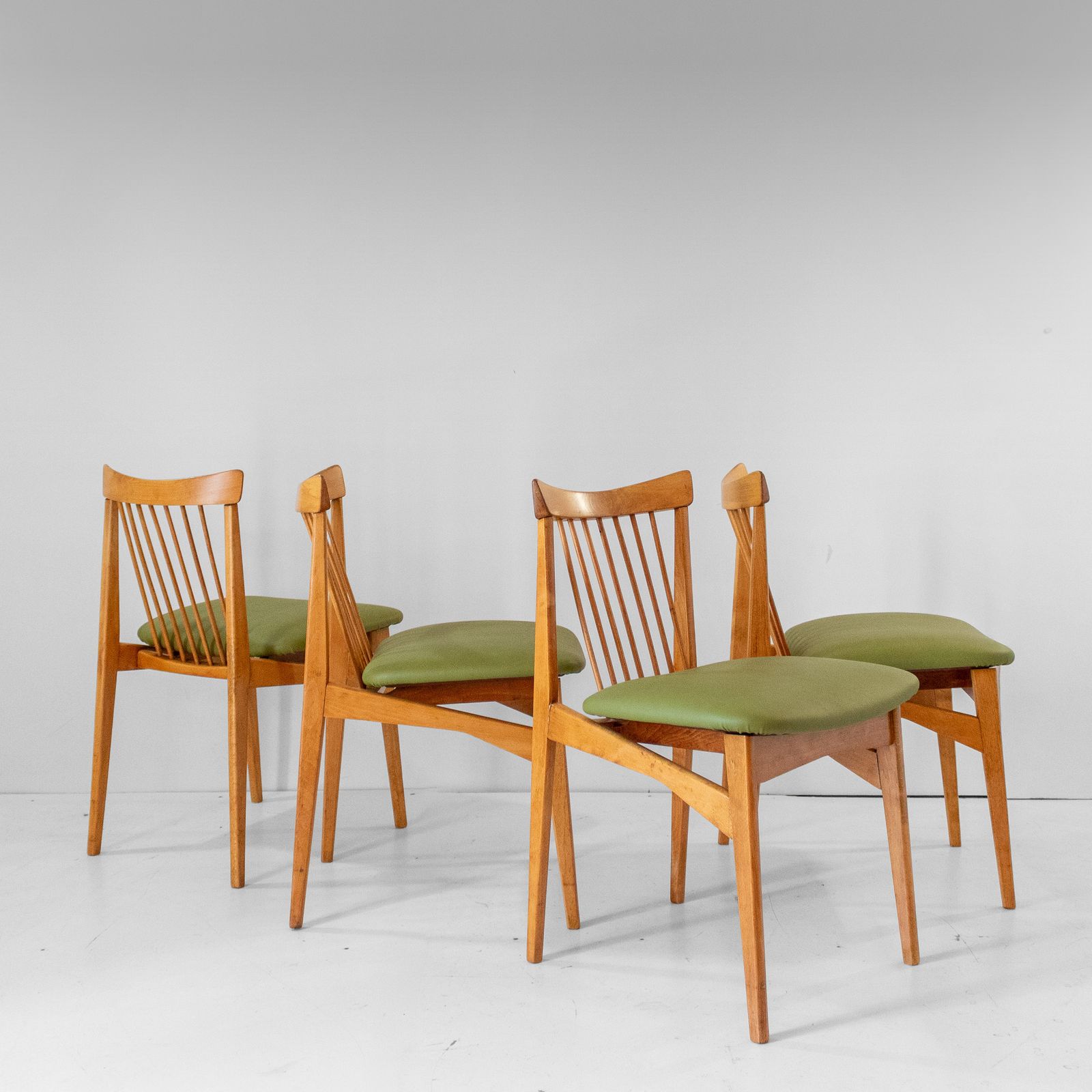 Four Mid Century Modern Italian Wood Dining Chairs In The Style Of Ico Parisi
