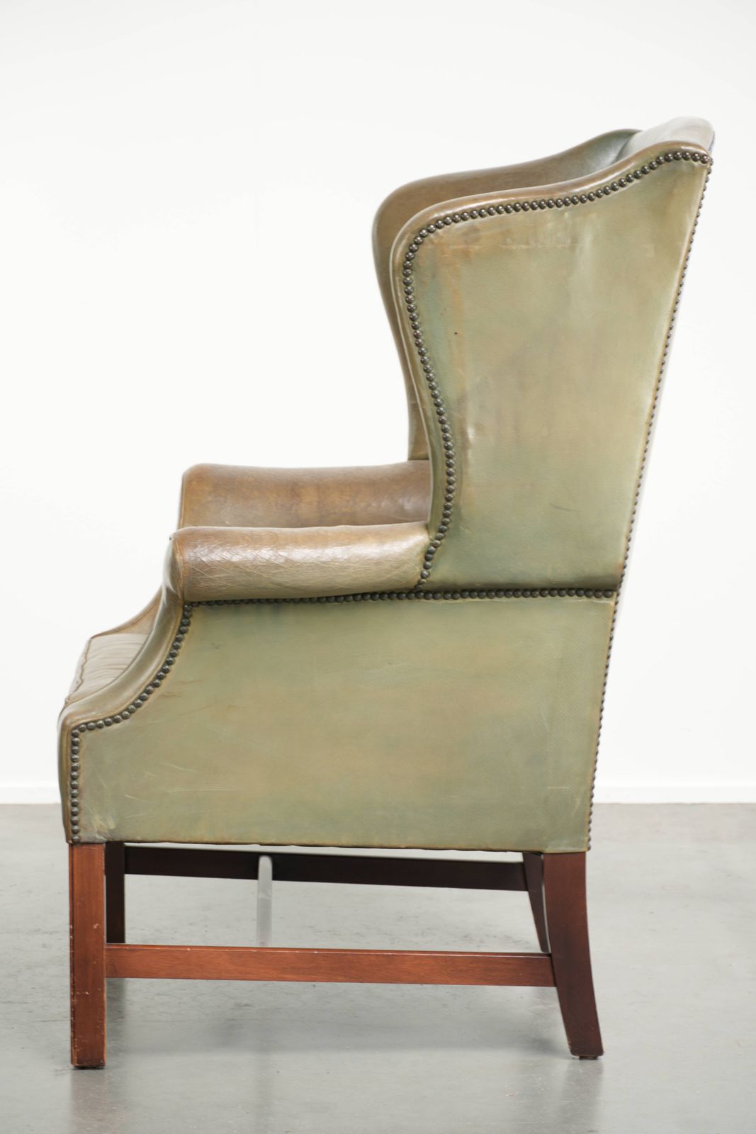 Old English Style Cowhide Wing Armchair With A Beautiful Patina And A Unique Color photo 614.0