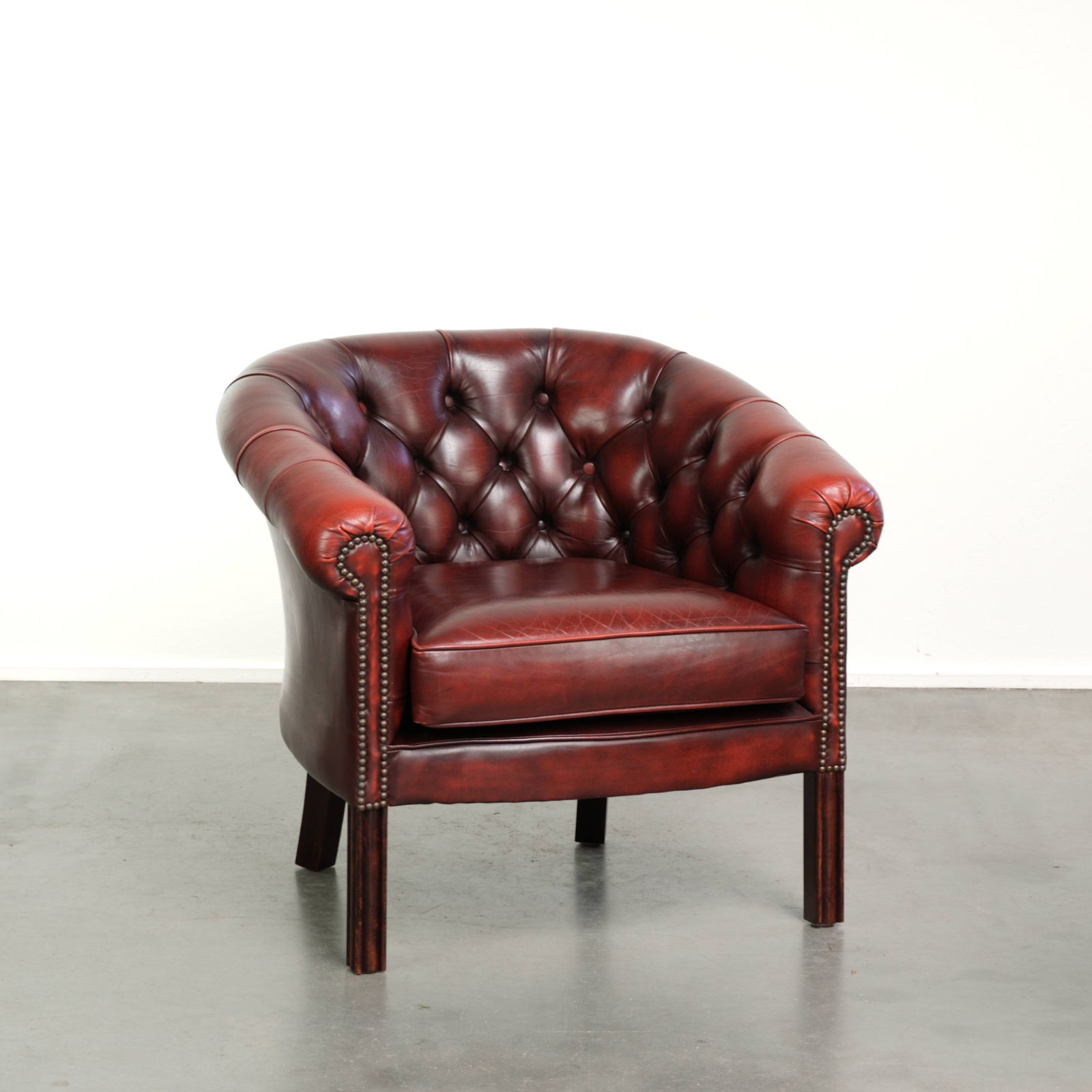 Nice, Subtle Cowhide Chesterfield Club Armchair In A Sought After And Timeless Red Color.
