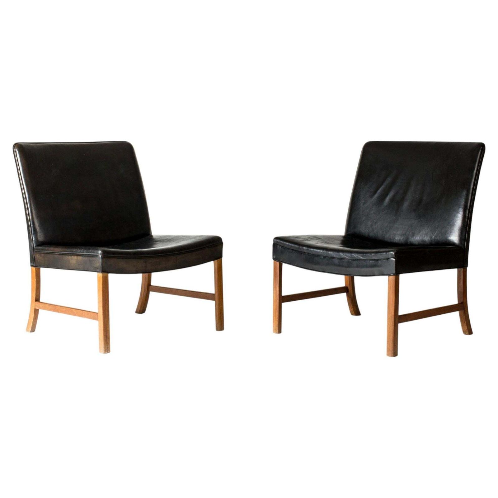 Danish Modern Mahogany And Leather Lounge Chairs By Ole Wanscher, Denmark, 1950s