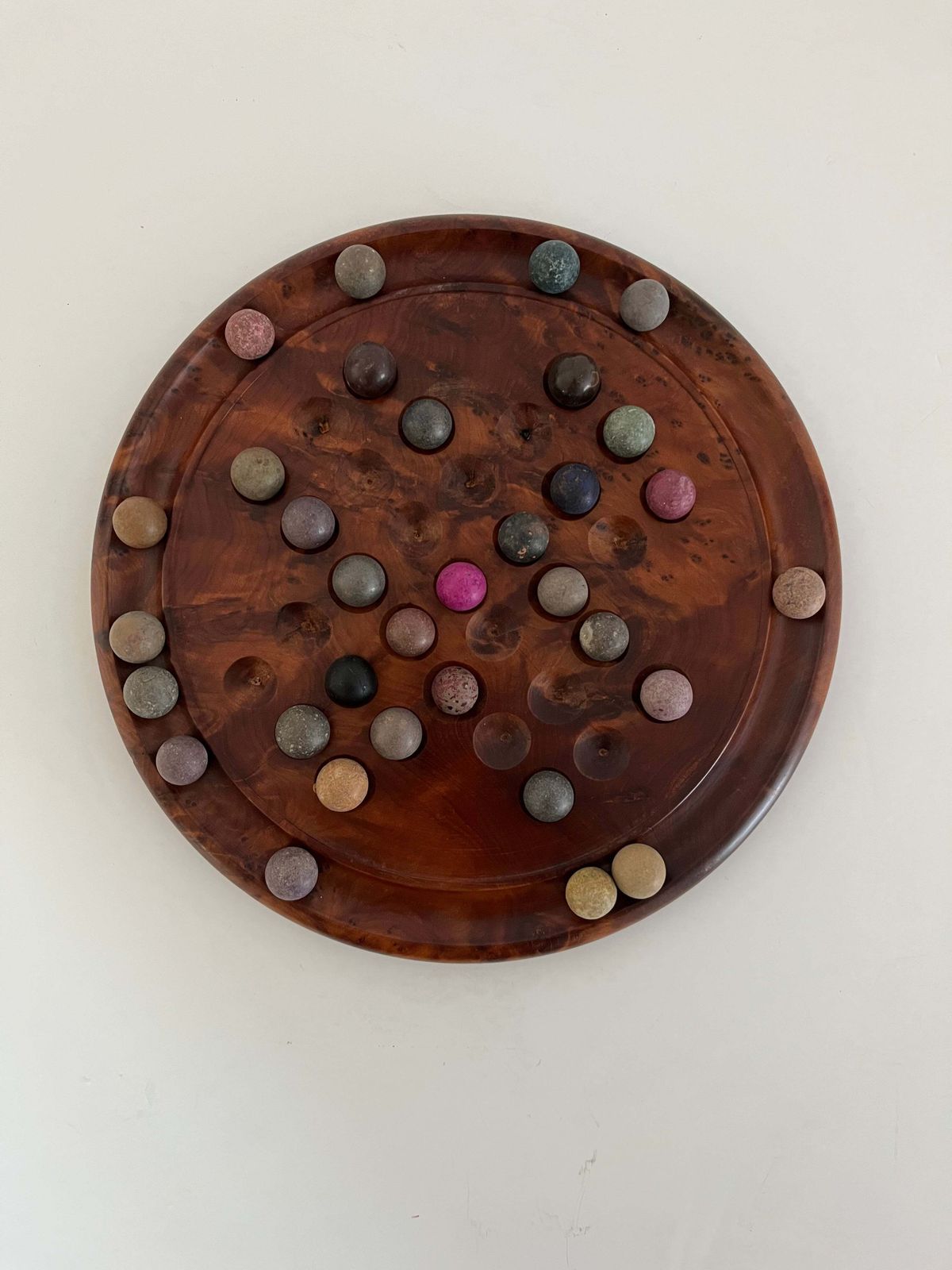 Marble Solitaire Board Game With 33 Handmade 19th Century Clay Or Stone Marbles. photo vinterior
