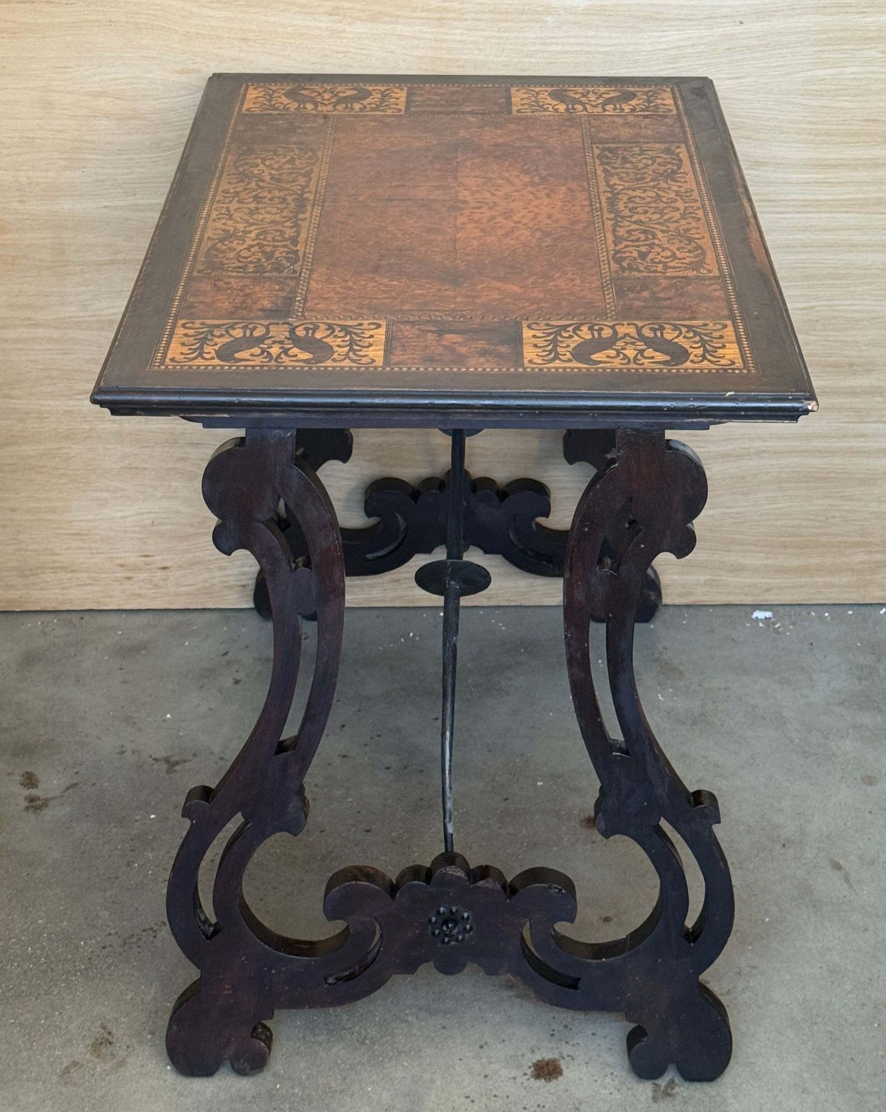 photo furniture Spanish Marquetry Sidetable With Bird Motifs Marquetry And Iron Stretcher