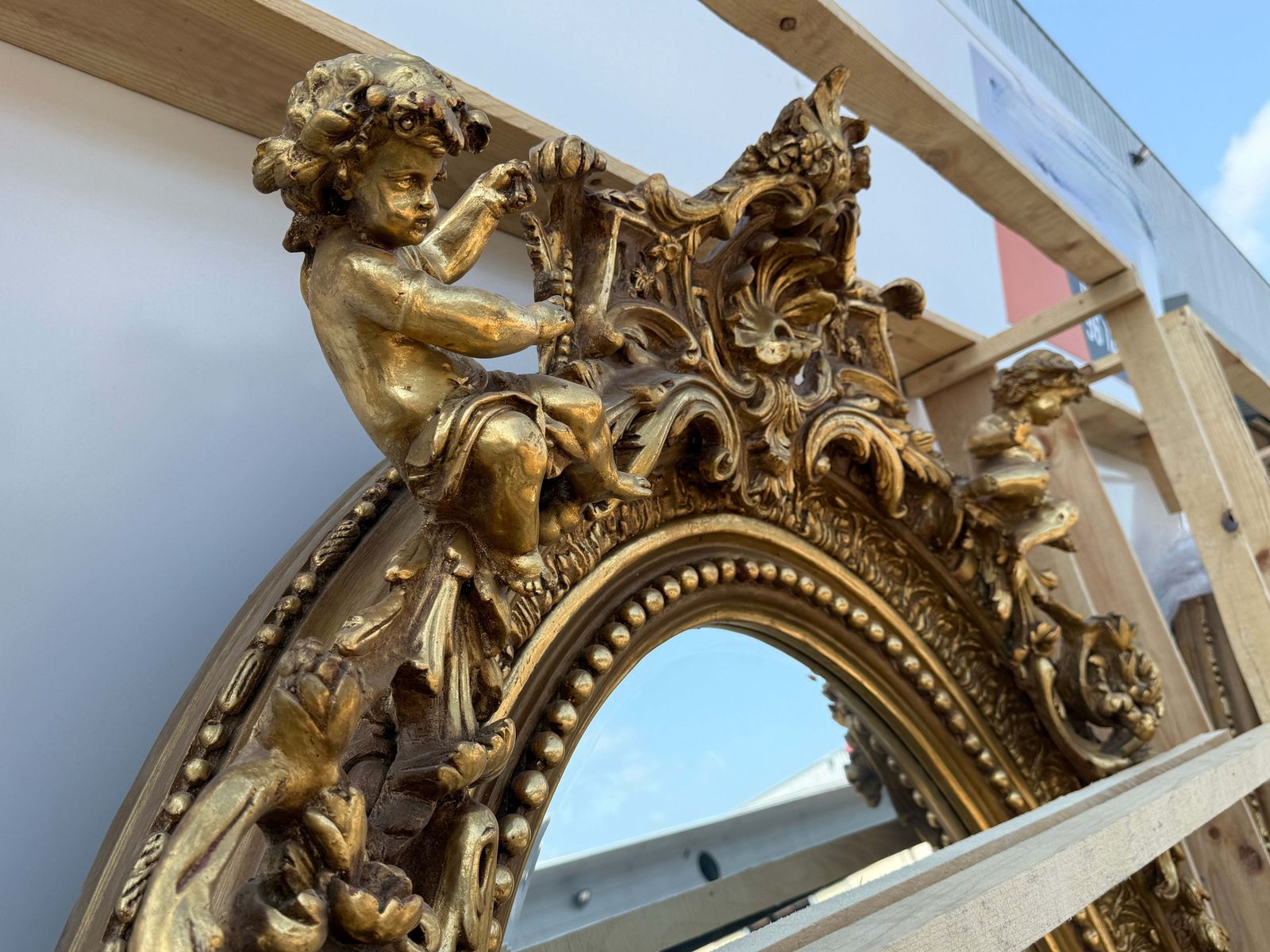 Baroque Revival French Giltwood Oval Mirror With Carved Cherubs, 92 Inches photo for sale