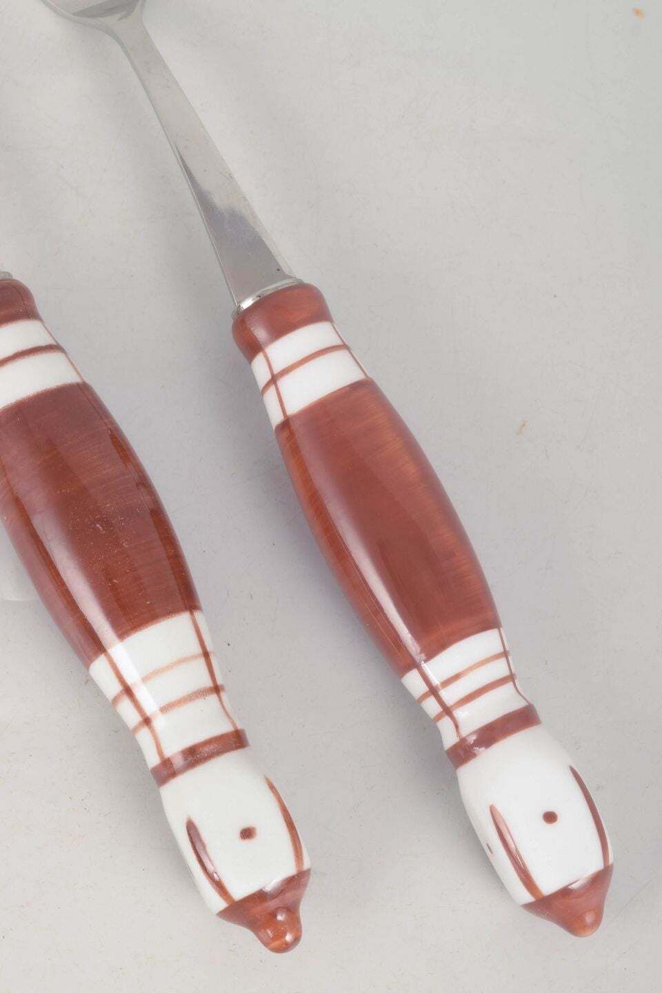 Bjørn Wiinblad, Rosenthal. Pair Of Meat Forks In Stainless Steel And Porcelain. photo furniture