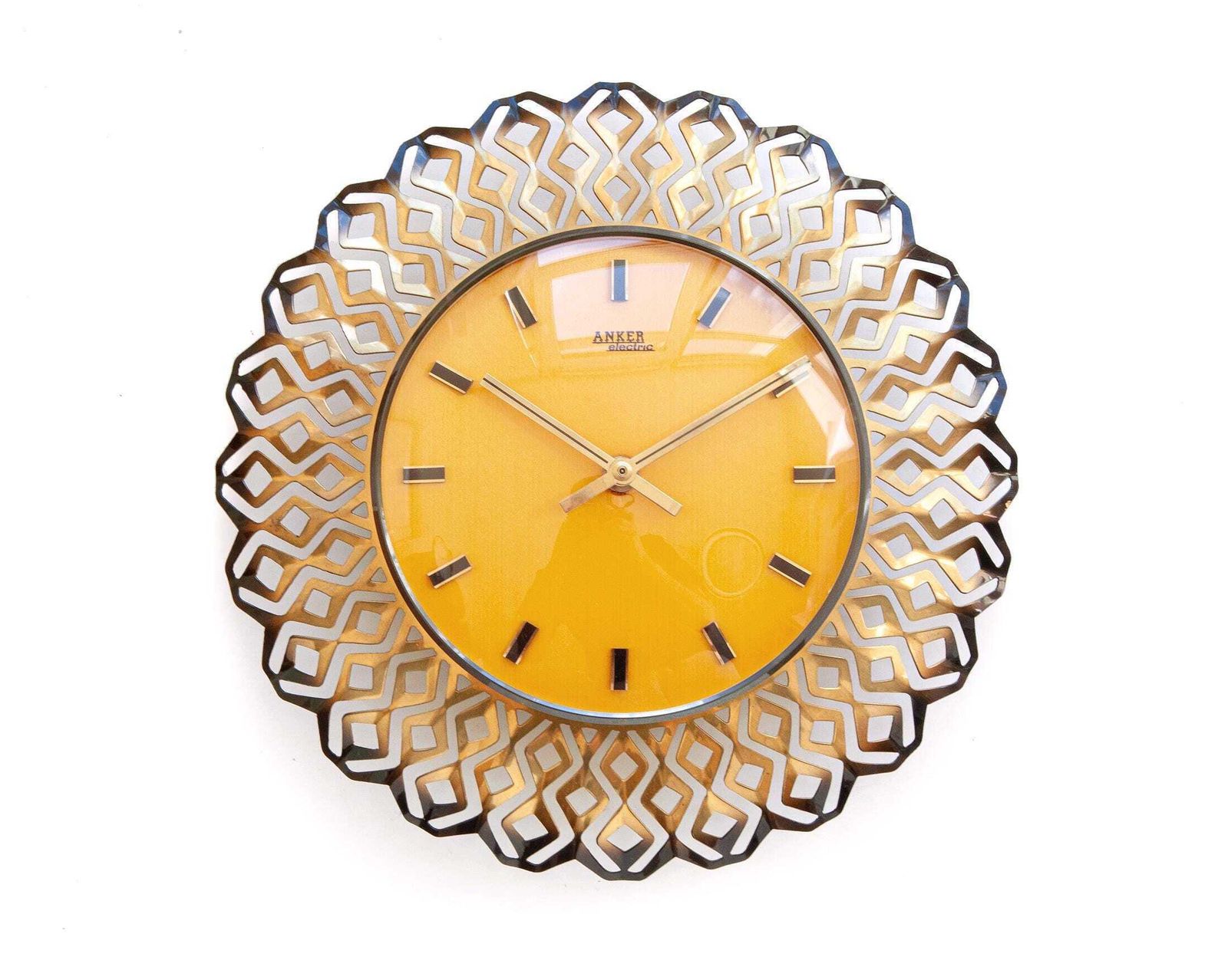 Mid Century Anker Germany wandklok modernisme Deens messing Space Age Atomic Starburst Junghans