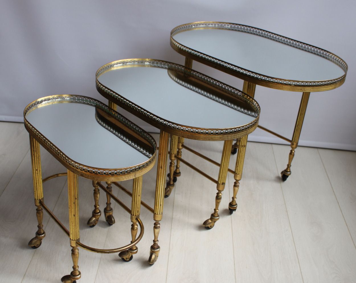 Nest Of Brass French Trolleys photo for sale