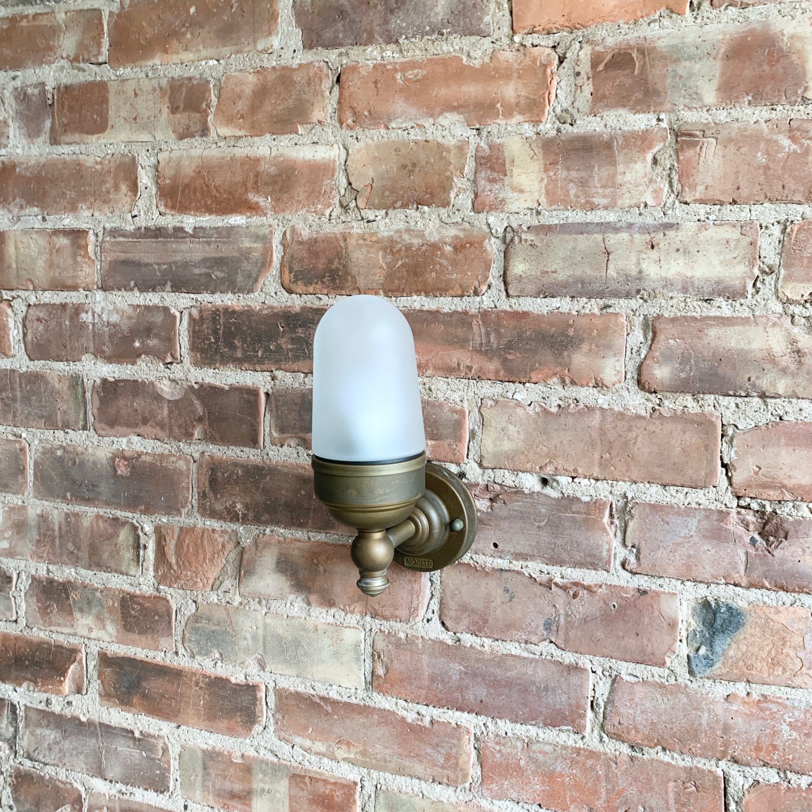Contemporary Aged Brass Torch Wall Light With Frosted Shade photo Garden Lighting