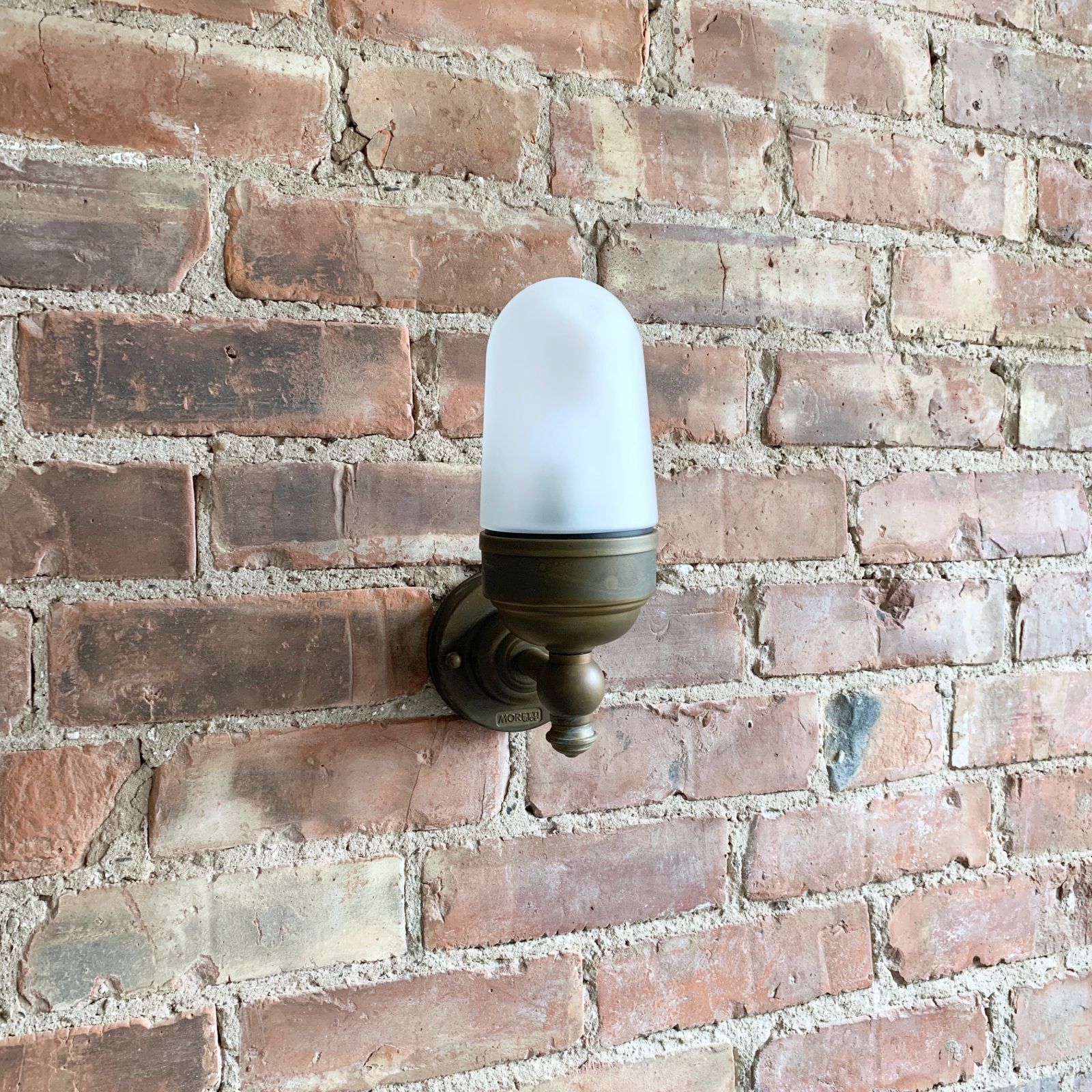 Contemporary Aged Brass Torch Wall Light With Frosted Shade photo 192.0