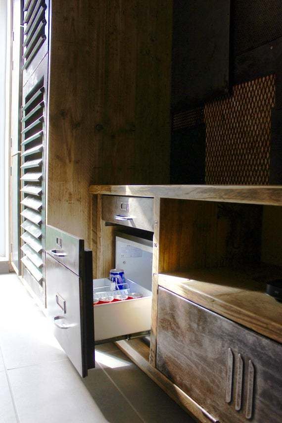 Tunni Reclaimed Scaffolding Board Media Unit With Vintage Filing Cabinet Components And A Distressed Sheet Steel Patchwork Feature Wall photo for sale