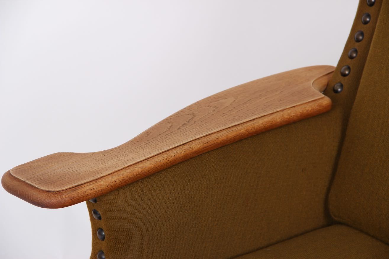 Danish Loungechair, 1970 Design In Solid Oak And Wool Fabric. photo vinterior