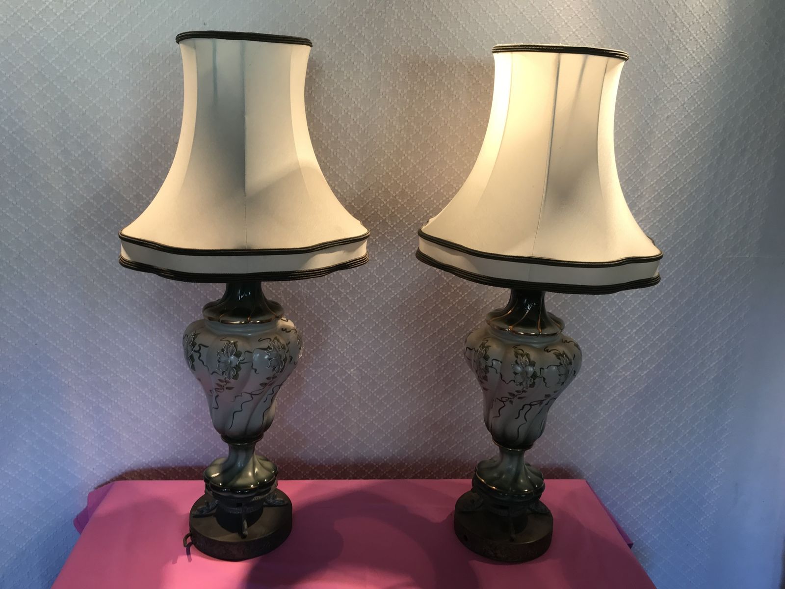 Pair Of Green Pottery Lamps With Embellished Flower Design And Lined Lampshades