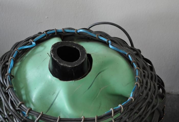 Glass Demijohn In Plastic Basket photo furniture