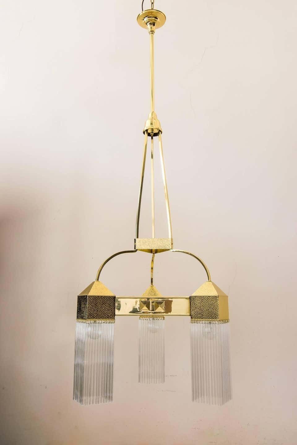 Big And Beautiful Hammered Art Nouveau Chandelier With Glass Sticks photo for sale