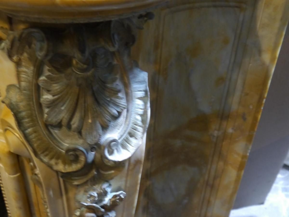 Home Fixtures A Stunning French Sienna Marble Surround With Ormolu photo