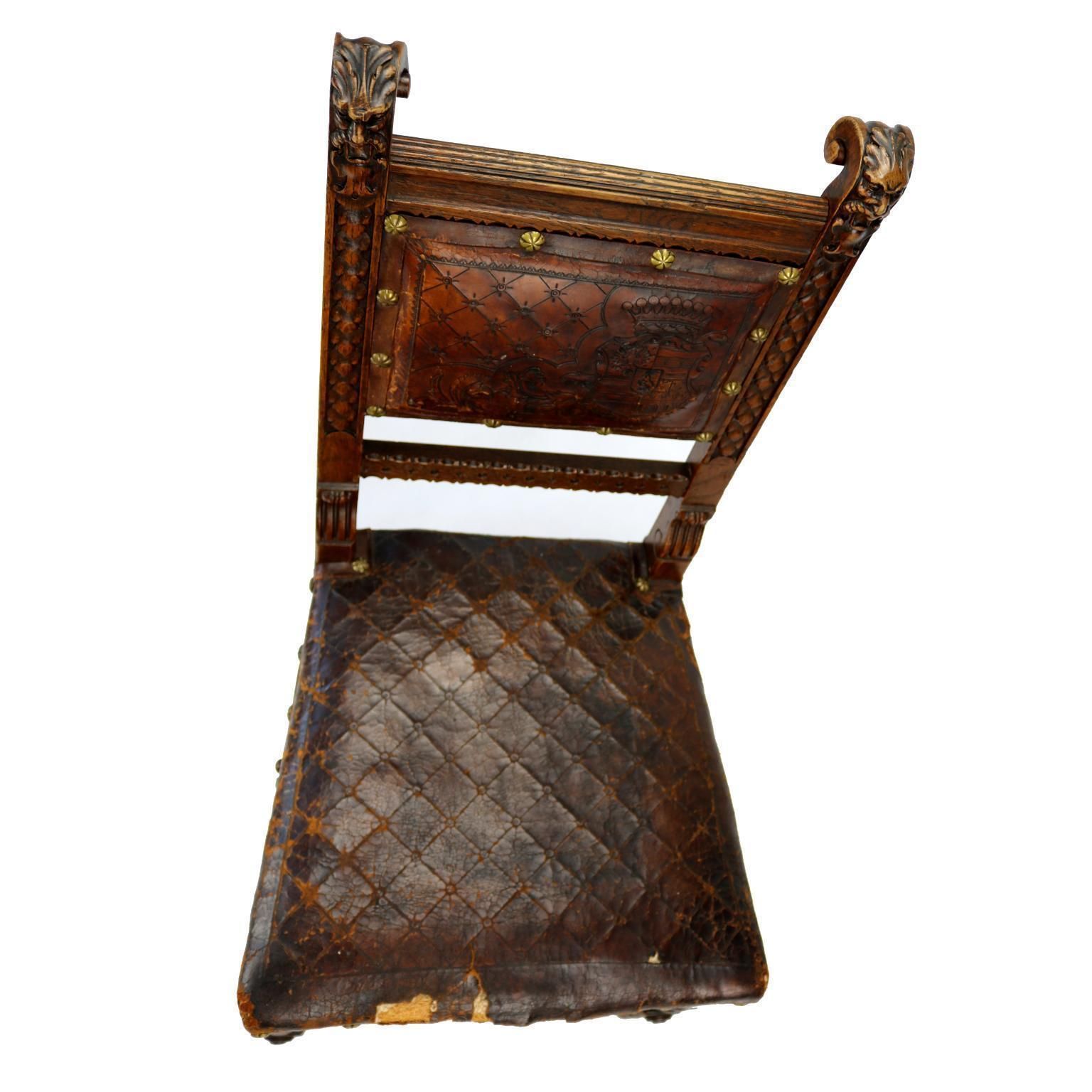 Reanaissance Revival Hand Carved Chair With Embossed Leather 19th Century photo for sale