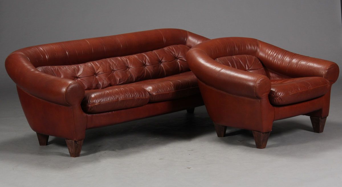 Fawn Leather Lounge Including A Sofa And Three Armchairs