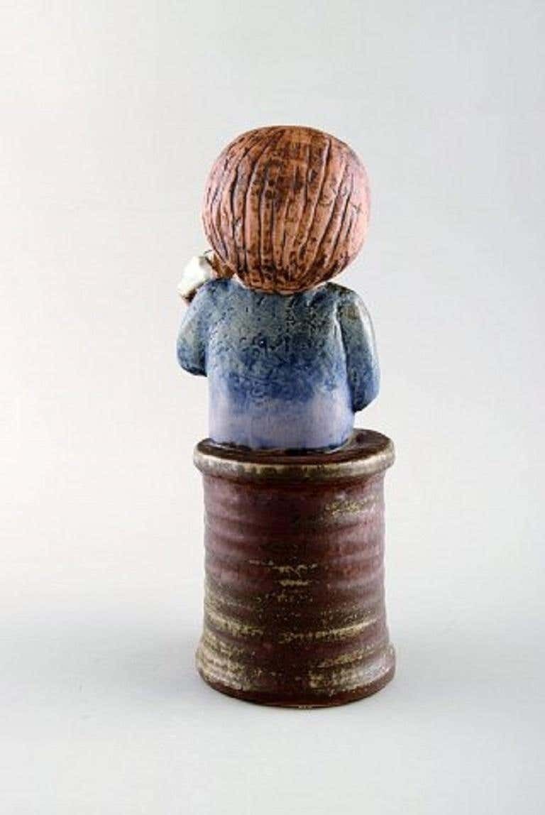 Lisa Larson For Gustavsberg, Girl With Flowers In Glazed Ceramics, 20th Century photo for sale