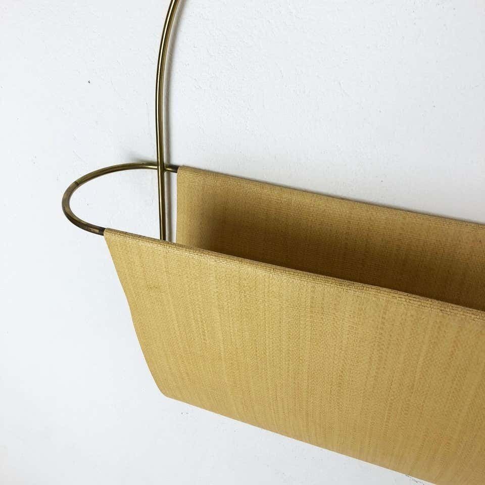 657.0 Vintage Brass Wall Hanging Magazine Holder photo