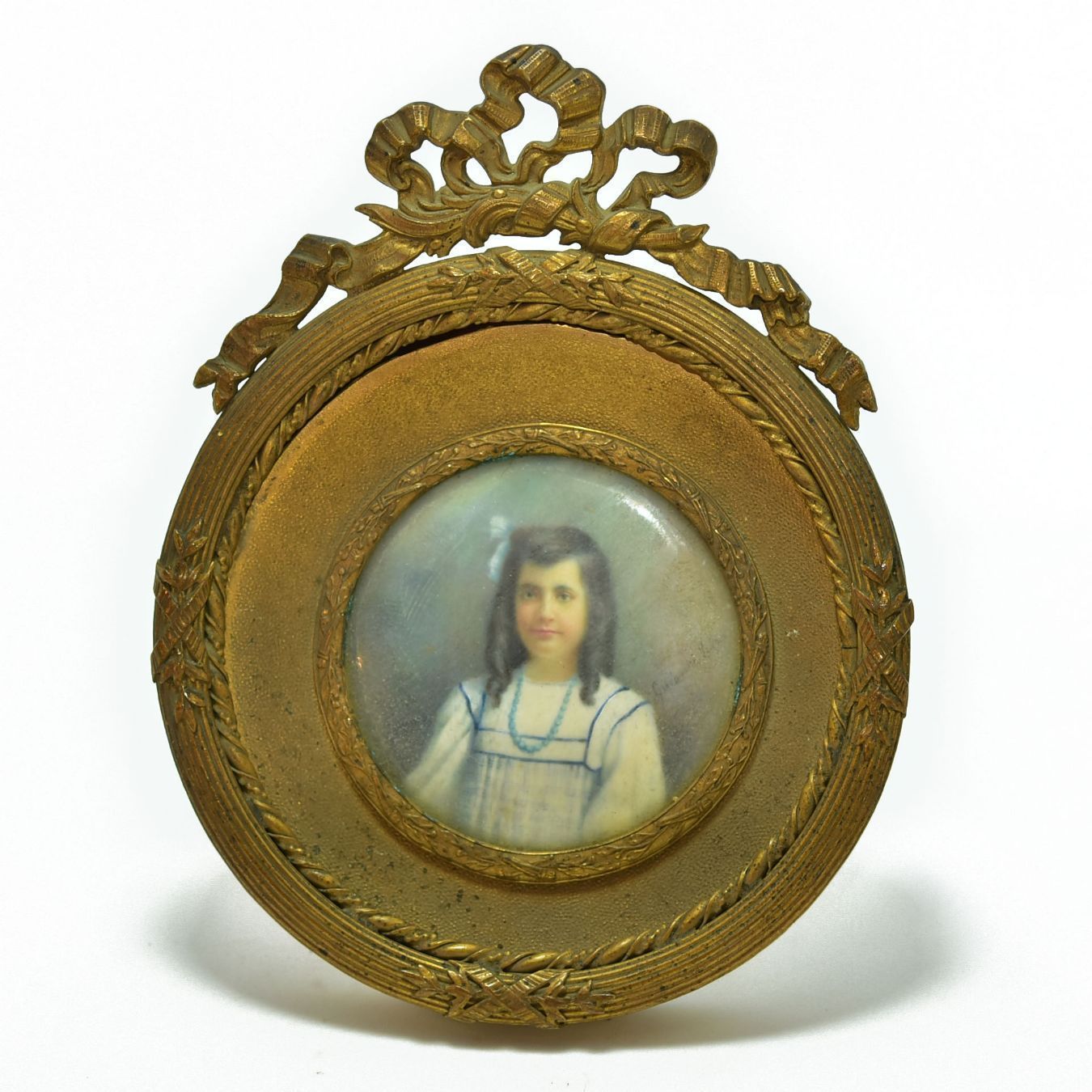 Miniature Portrait In Medallion Young Girl With Brown Curls Gilt Bronze Frame With Ribbons