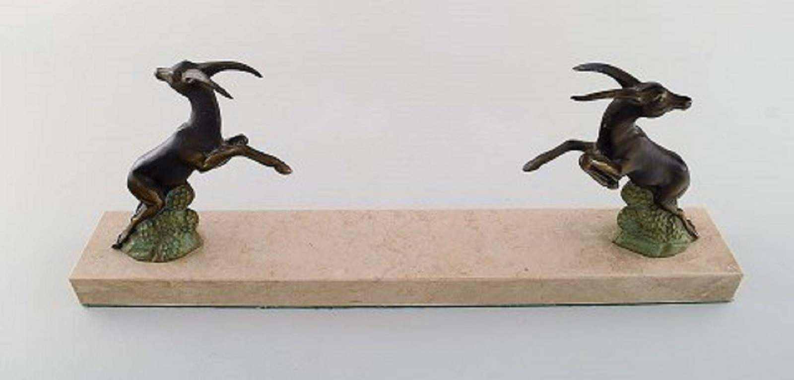 Art Deco Sculpture Of Jumping Bucks In Patinated Metal On Marble Base, 1930s photo vinterior