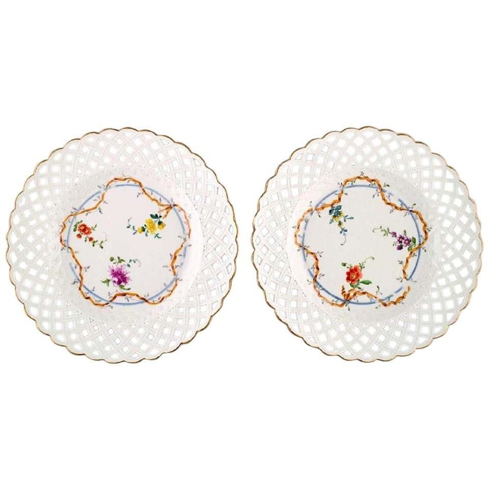 Two Antique Meissen Plates In Pierced Porcelain With Hand Painted Floral Motifs