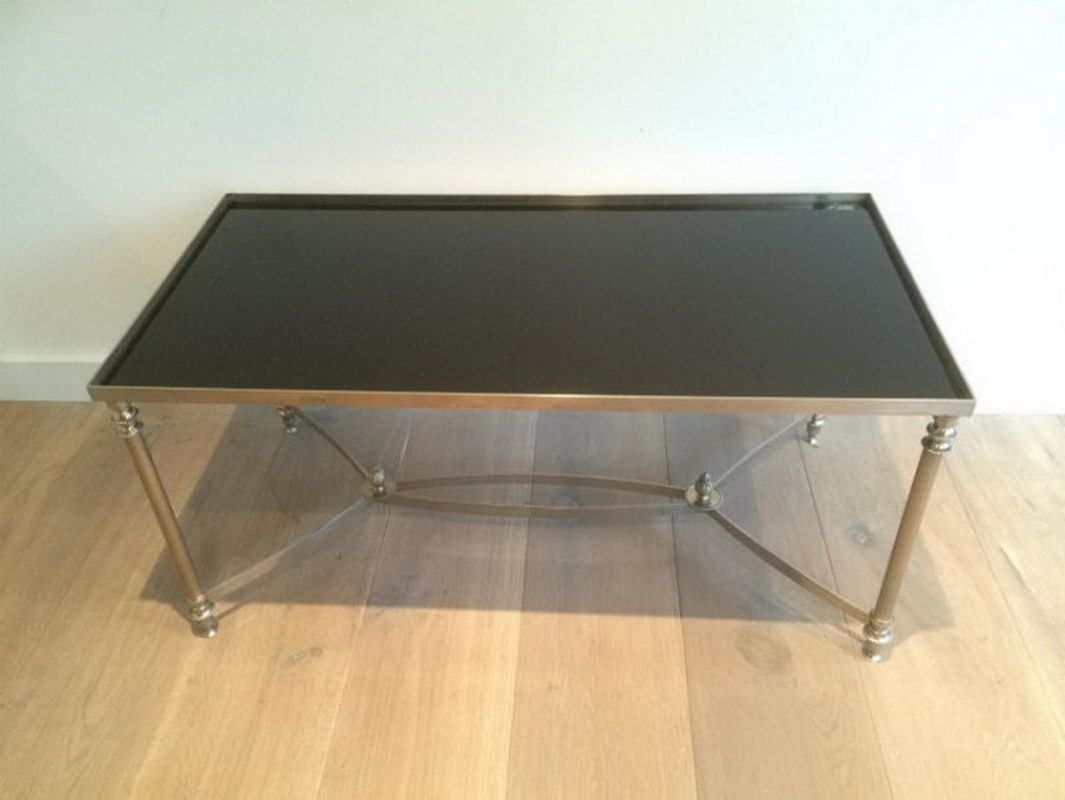 In The Style Of Maison Jansen. Silvered Coffee Table With Black Lacquered Glass Top. Circa 1940 photo furniture