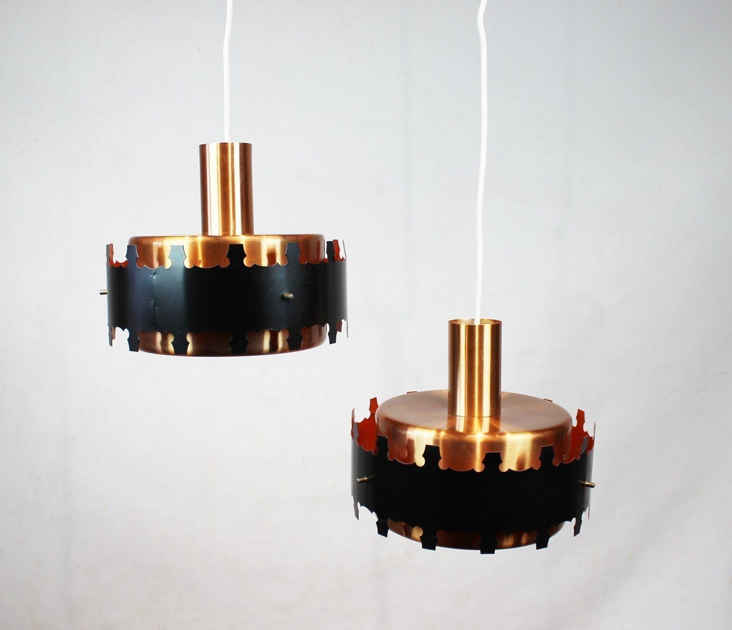 A Pair Of Pendants Of Copper And Black Metal, Of Danish Design From The 1970s. photo furniture