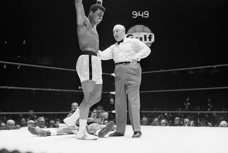 'Muhammad Ali' Raises Arms In Victory 1966 Archival Pigment Print Framed In Black photo furniture