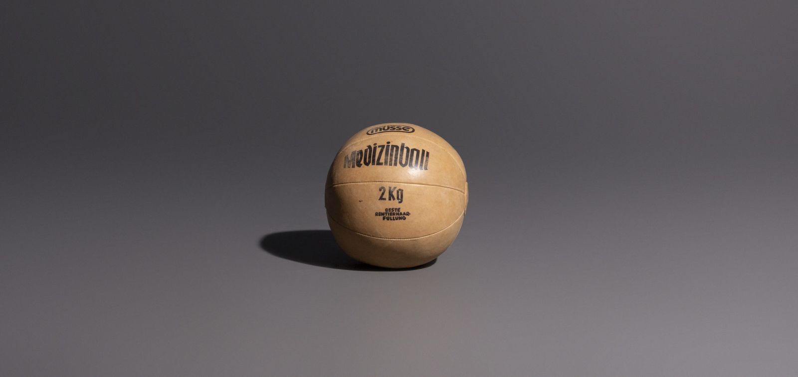 Vintage Medicine Balls Made Of Light Brown Leather photo furniture