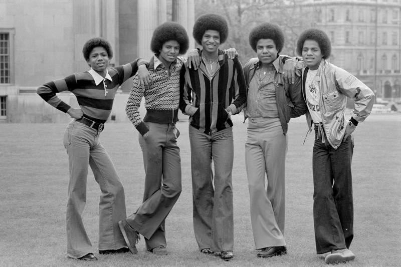 'The Jackson Five In Hyde Park' 1977 Archival Pigment Print Framed In Black photo furniture
